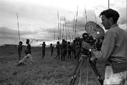 Researchers and warriors standing on the Tokolik -- filming in foreground