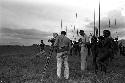 Researchers and warriors standing on the Tokolik