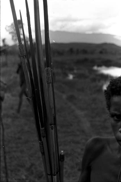 Close up of woven pieces of spears or arrows