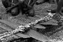 The sus with yé stones (exchange stones) and kaneken (woven cowrie shell bands) on top of them