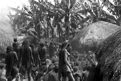 A long shot of the sili, women's group in the foreground