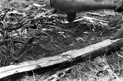 Splitting wood with a stone axe