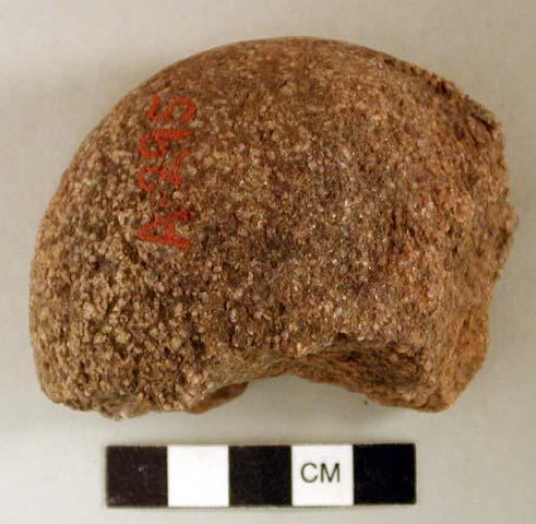 Ground stone, pounding stone fragment