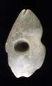 Ground stone effigy pipe, fish.