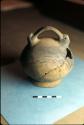 Ceramic vessel with handle