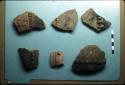 Molded and incised ceramic sherds