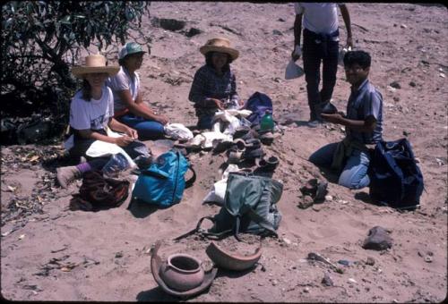 Crew with surface collected pots at Site 93 or 94