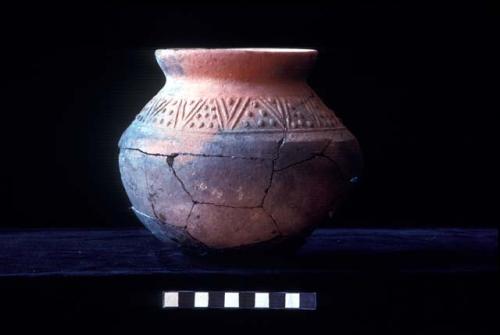 Short everted neck jar with press molded lines and dots from Site 94