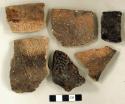 Ceramic, earthenware rim and body sherds, some cord-impressed, some undecorated, some shell-tempered, some grit-tempered