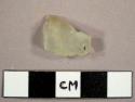 Green/yellow glass fragment, possibly burnt or frosted