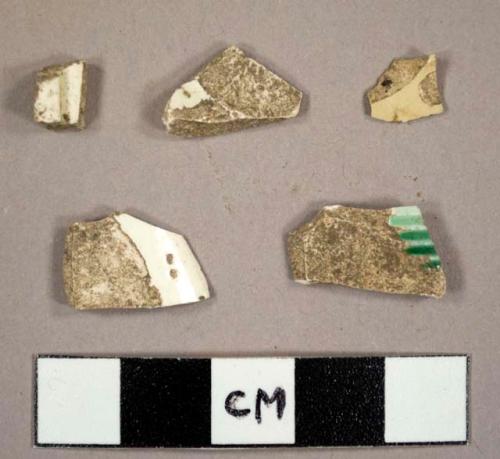 Assorted earthenware sherds, including green shell-edged pearlware and creamware sherds