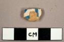 Tin-glazed earthenware sherd with hand painted blue on white design