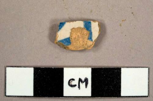 Tin-glazed earthenware sherd with hand painted blue on white design