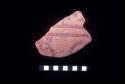 Incised red and cream slip ceramic sherd from Site 131