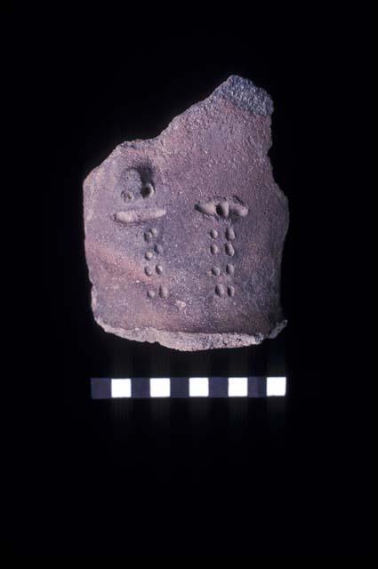 Crying face tall neck sherd from Site 120