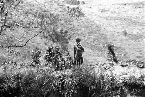 Woman by the bank of the Baliem River