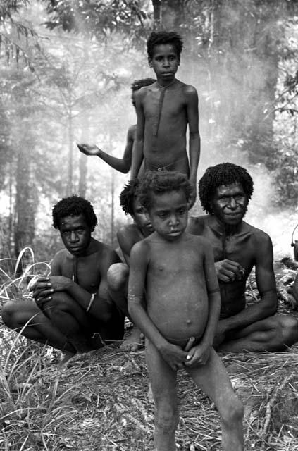 Tukom, Weneluké, Ekat and others outside Robert Gardner's tent