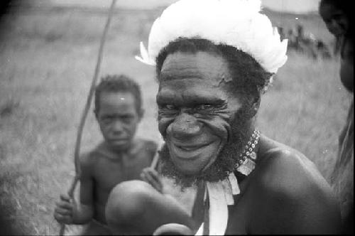 Pumika smiles towards the camera while seated