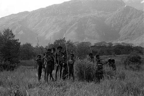 Boys watch the dancing at an Etai