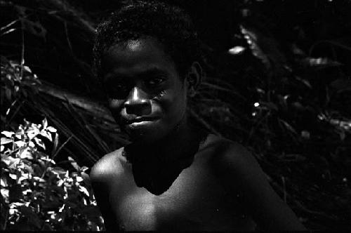 Child on the beach in Biak