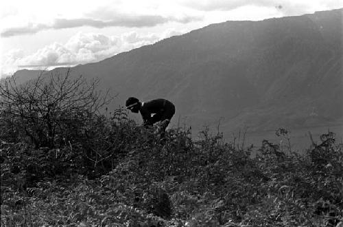 Man on a ridge high in the Tukumba, hills beyond