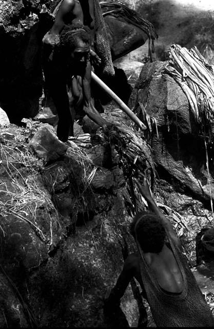 Women working together in the salt well