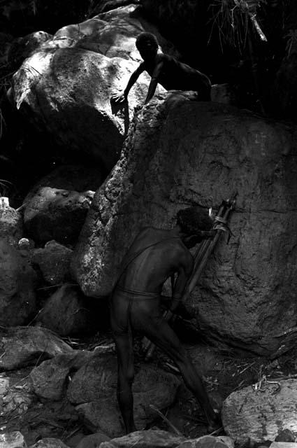 Men among the rocks near the salt well