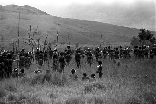 Large group of warriors watching the battle front and waiting