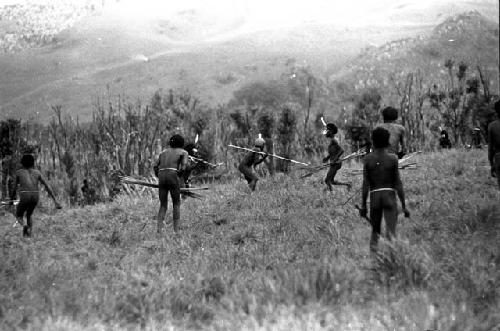 Warriors with spears in action close to the front lines