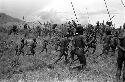 Warriors running with spears to the front line