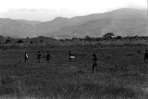 Warriors with spears on their way to a battle on the Tokolik