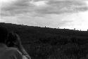 Robert Gardner filming warriors going home along the ridge of the Warabara