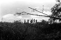 People on the bank of the Aikhé River waiting to greet the boat carrying Peter Matthiessen