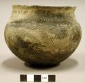 Ceramic jar, brushed and incised, short flared neck, shell tempered
