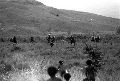 Intense battle on the Tokolik -- Willihiman-Wallalua warriors in the foreground, Wittaia warriors in the middle ground; hills beyond