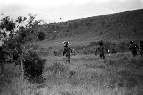 Willihiman-Wallalua warriors attack the Wittaia warriors, seen beyond in the middle ground