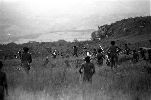 Willihiman-Wallalua warriors attack the Wittaia warriors, seen beyond in the middle ground