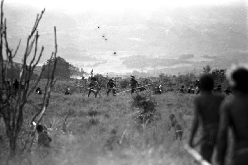 Willihiman-Wallalua warriors attack the Wittaia warriors, seen beyond in the middle ground