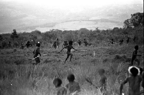 Willihiman-Wallalua warriors attack the Wittaia warriors, seen beyond in the middle ground