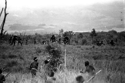 Willihiman-Wallalua warriors attack the Wittaia warriors, seen beyond in the middle ground