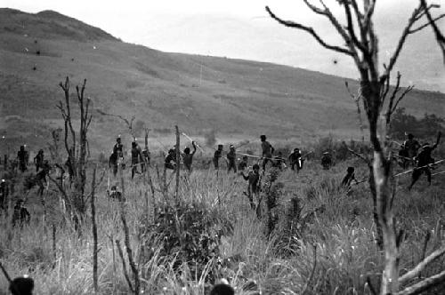 Willihiman-Wallalua warriors attack the Wittaia warriors, seen beyond in the middle ground