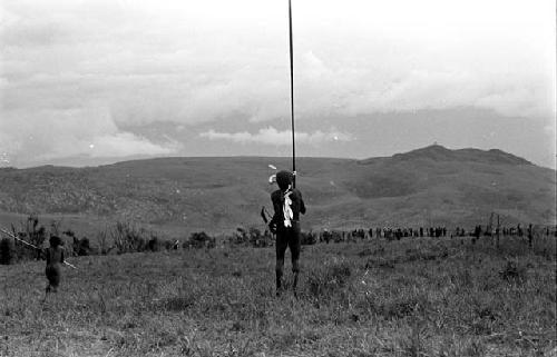 Willihiman-Wallalua man dancing, Wittaia seen in the distance