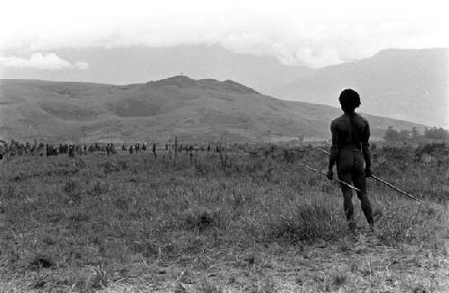 Willihiman-Wallalua warrior standing alone, Wittaia seen in the distance