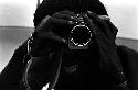 Tekman Biok looks through a Nikon camera