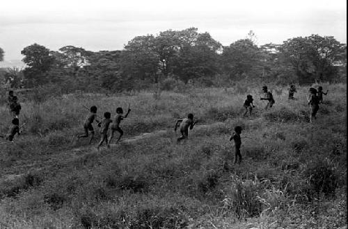 Men and boys playing on a field