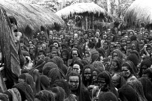 great mob of women at a funeral