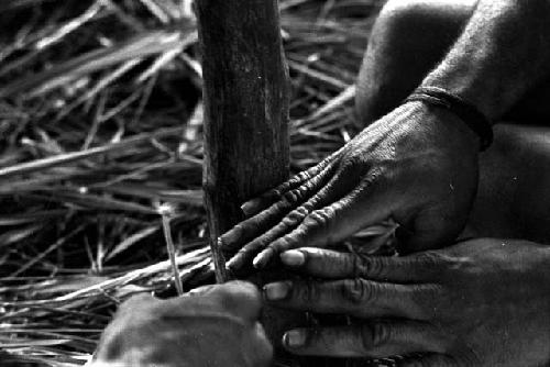 man being cleaned by a feather