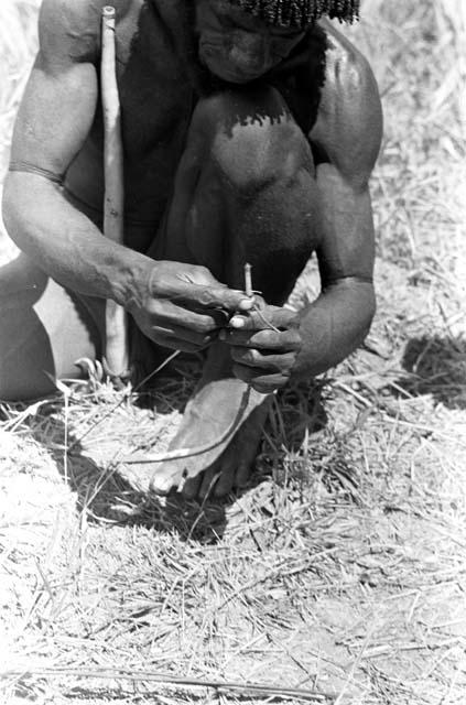 preparing the toy bow that will be placed in the base of the kaio