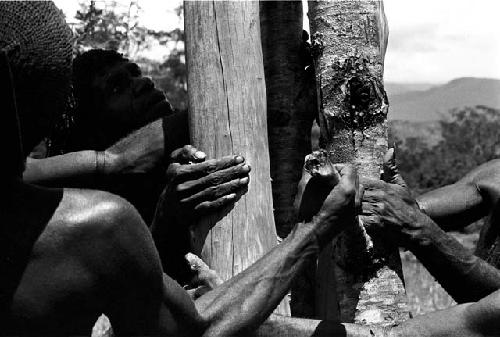 man using an axe