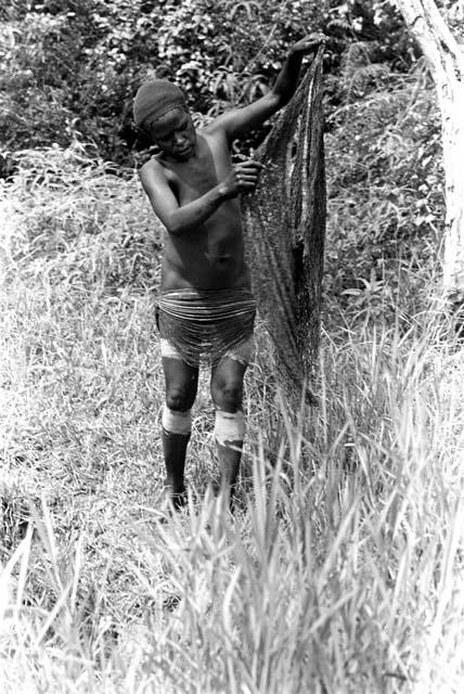 women putting on clay